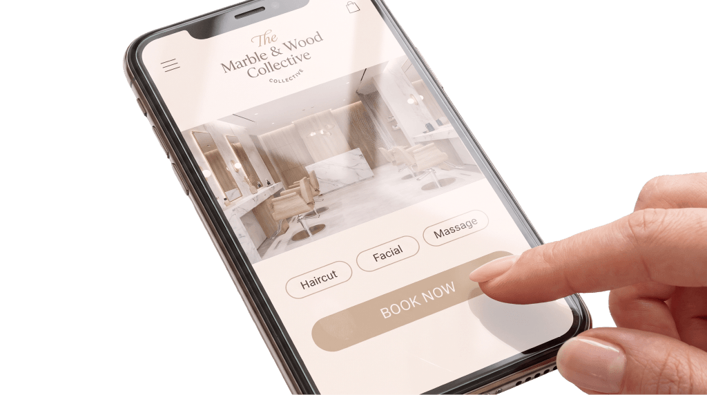 A hand tapping Book now on a salon booking screen